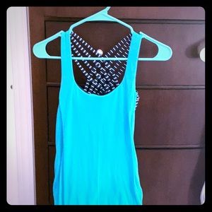 Strappy Athletic tank size xs/s. Slim fit.